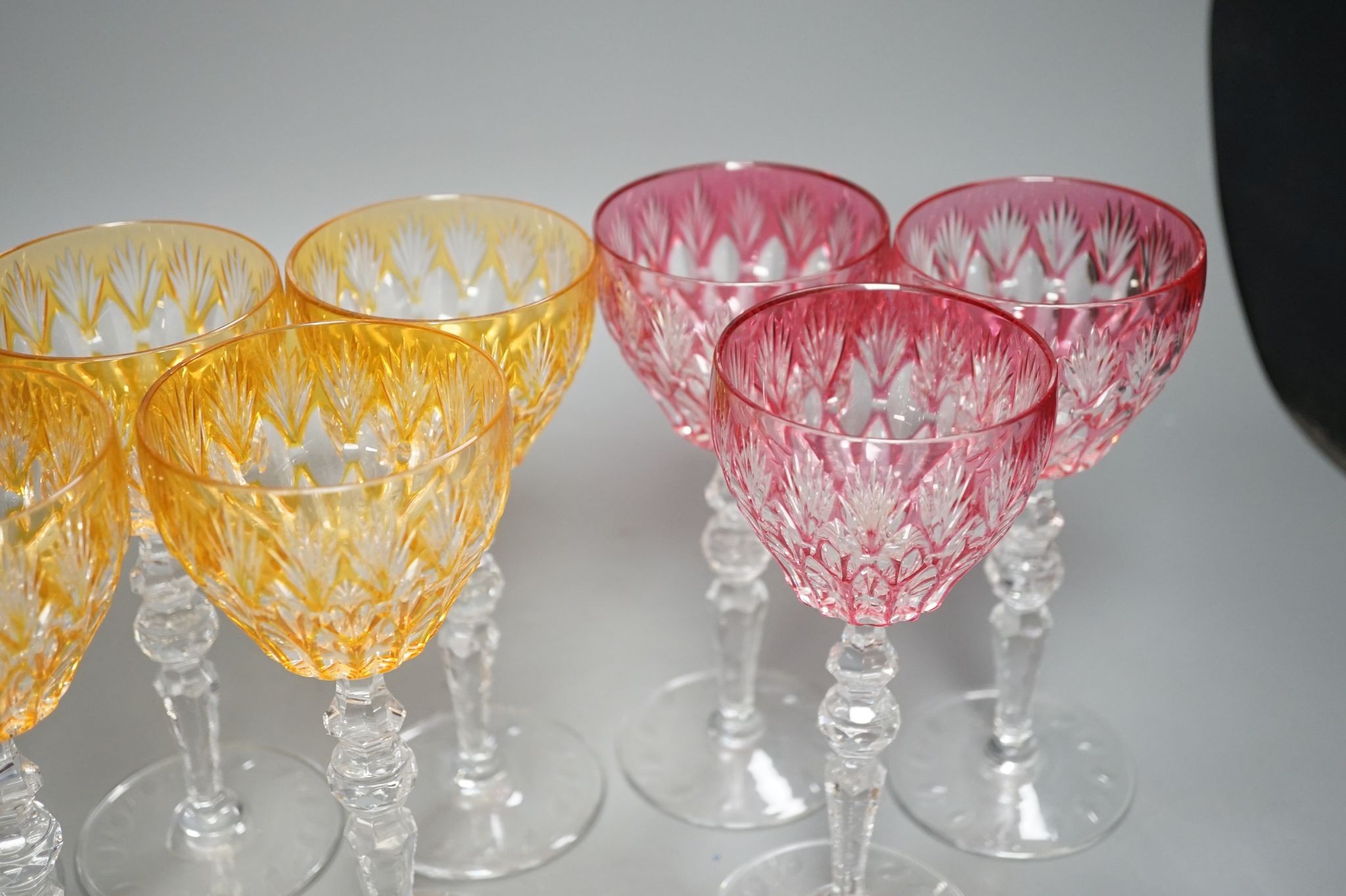 Eight hock or claret wine glasses, with colour flashed bowls, 20cm